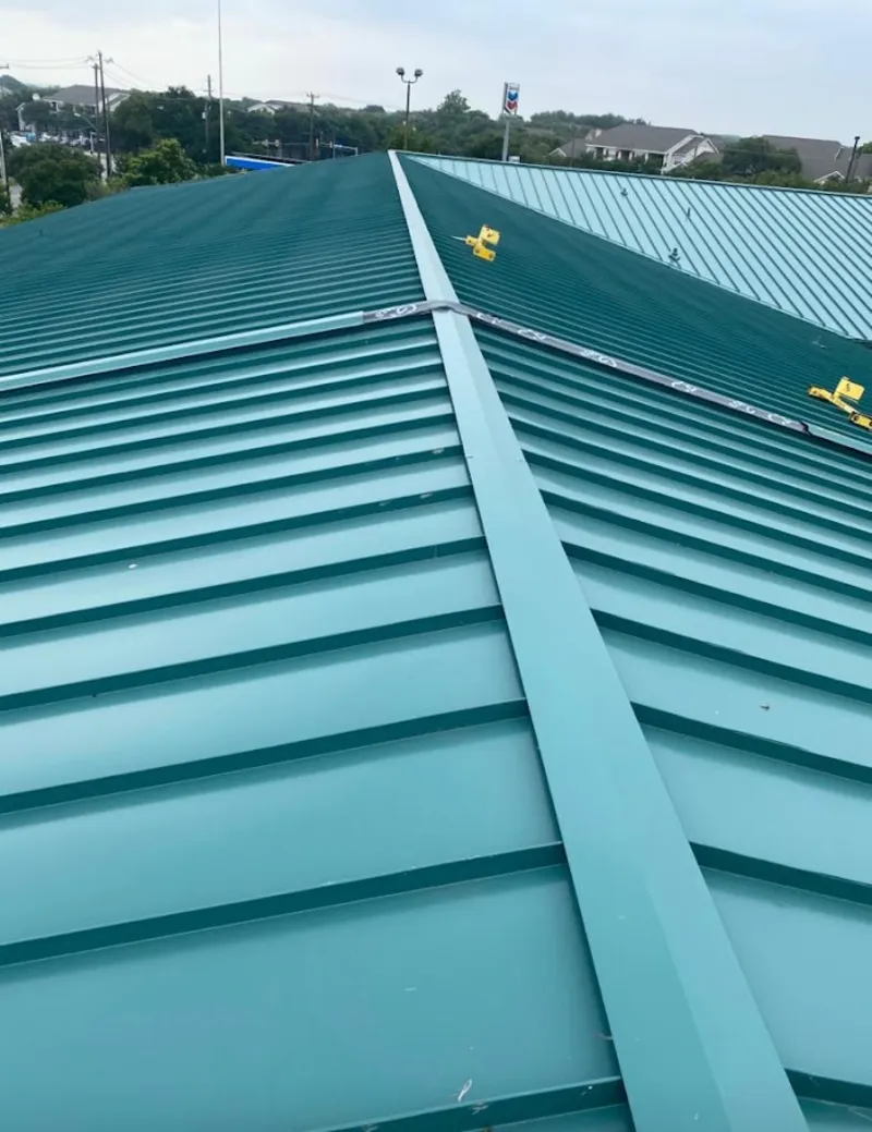 Green commercial metal roof ridge and valley for Metal Roof Repair in Cloverly
